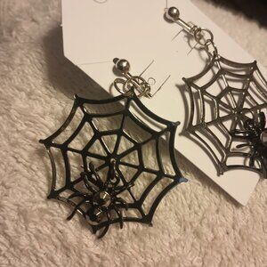 Silver tone Spider Web Clip Earrings with Black Crystal Spiders.